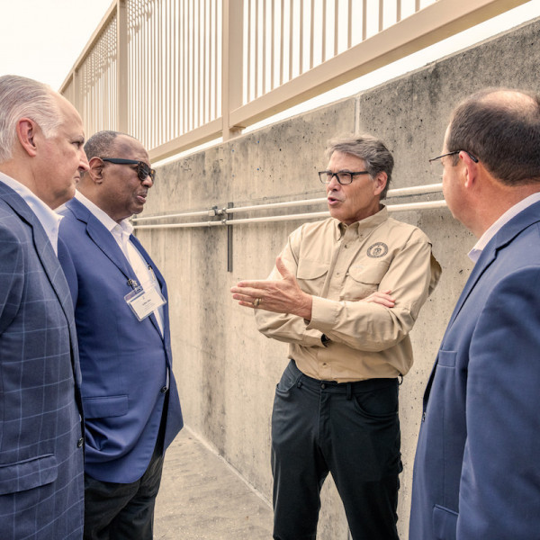 Front from left, TECO's Board Chair Bradley Howell, University of Texas Regent Jodie Lee Jiles, Secretary of Energy Rick Perry, TECO President and CEO Steve Swinson tour TECO's plant site.