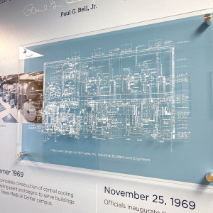 The timeline wall includes the schematic for the Central Plant's original chillers.